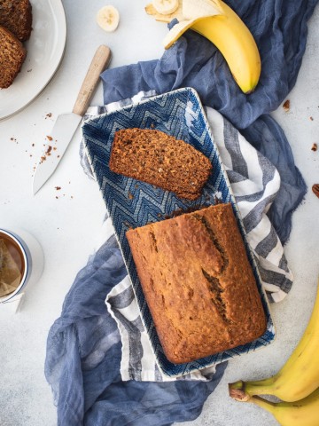Photo of healthy banana bread loaf with slices