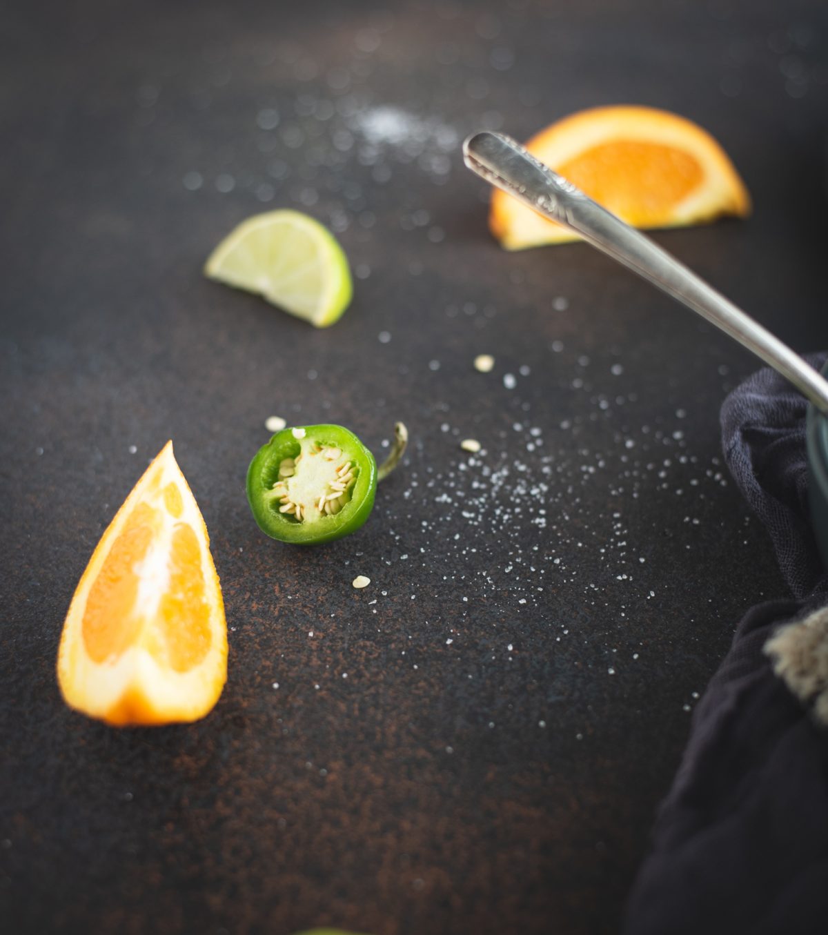 Close up picture of jalepeno and orange slices