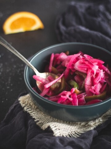 Bowl of pickled red onions up close picture