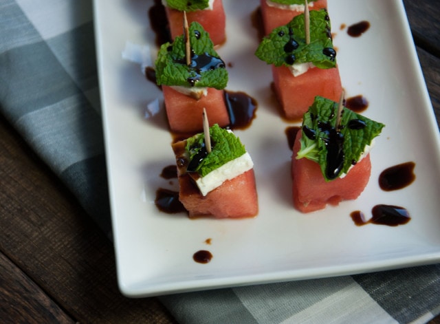 These watermelon feta mint skewers are refreshing as is, but the tangy balsamic glaze makes this healthy appetizer absolutely delicious!