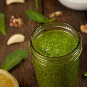 Easy arugula walnut pesto is the perfect sauce for pasta, gnocchi, sandwiches or anything else you can think of, and it only takes 10 minutes to make!