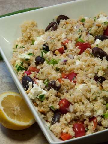 This Greek quinoa salad is filling, full of fresh flavors, and packed with nutrients with only 241 calories and over 8 grams of protein per serving.