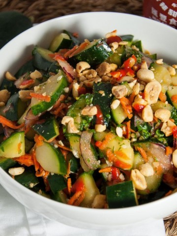 Thai cucumber salad with tangy lime, fresh cilantro and a hint of spice will rock your taste buds. Perfect paired with other Thai dishes or on its own- Yum!