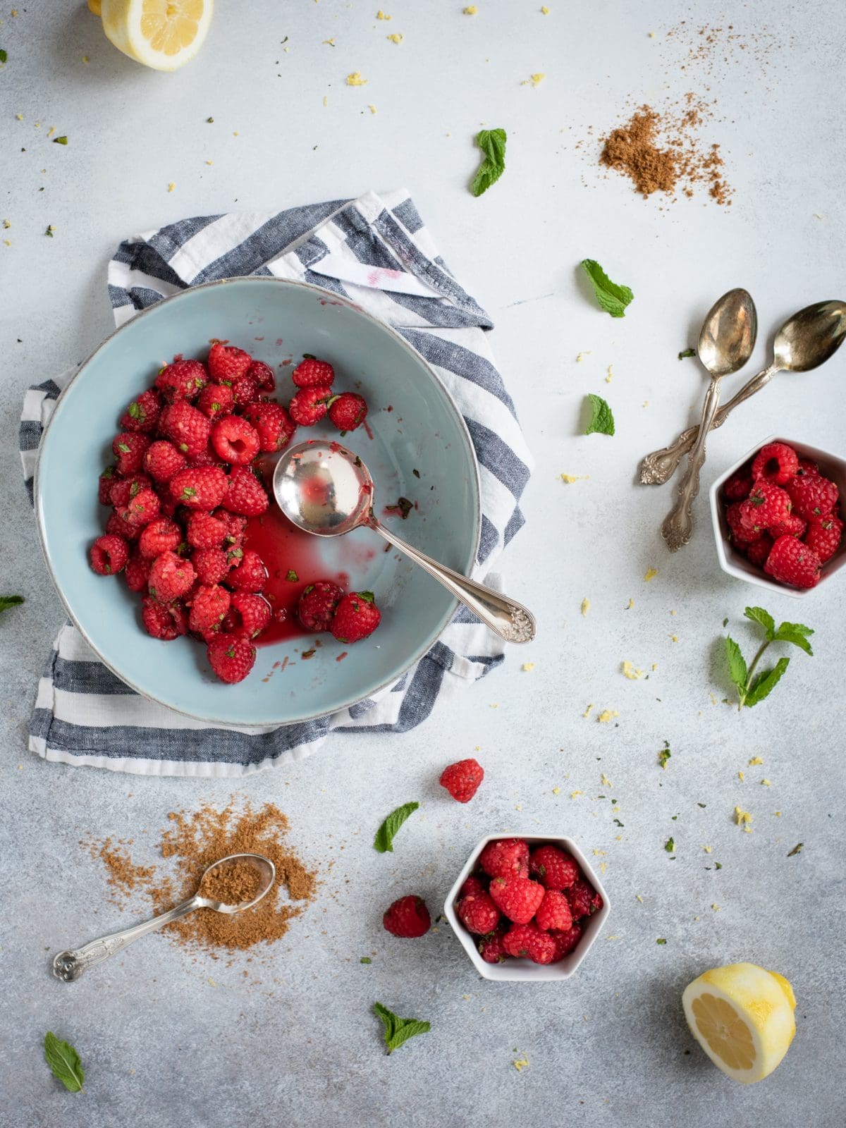 Overhead picture of Raspberries with lemon zest and mint