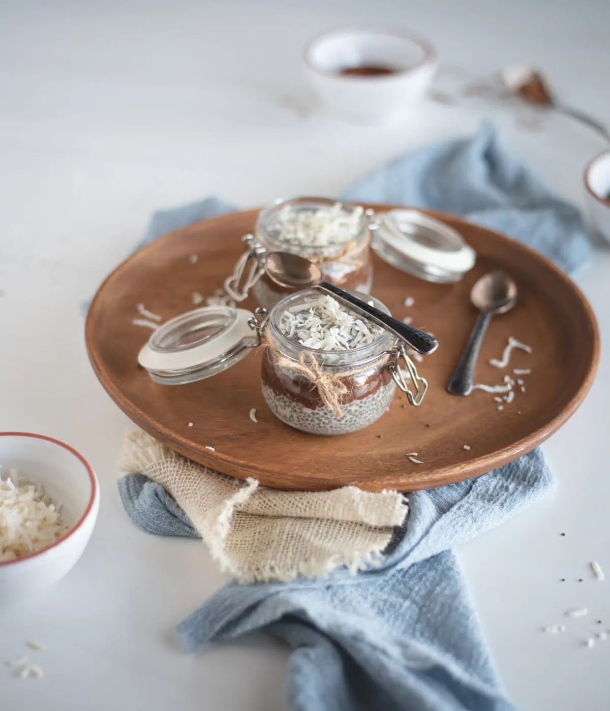 layered almond joy chia seed pudding in jars