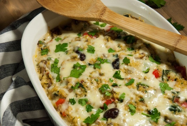 Cheesy quinoa casserole with creamy white sauce is rich, comforting, and loaded with nutritious veggies with just 350 calories in each generous portion.