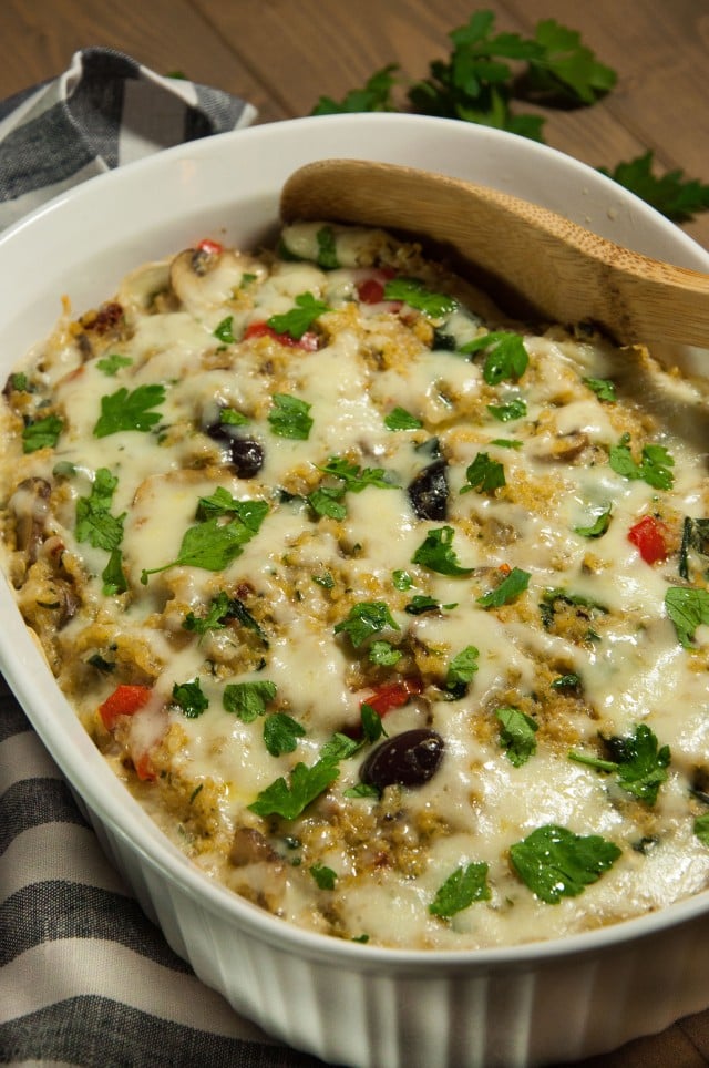 Cheesy quinoa casserole with creamy white sauce is rich, comforting, and loaded with nutritious veggies with just 350 calories in each generous portion.