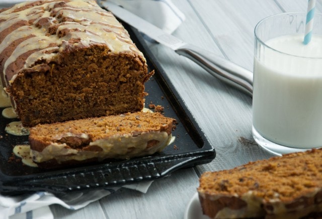 This healthy pumpkin bread is made with 100% whole wheat flour and other wholesome ingredients, leaving room for topping with a zesty orange decadent glaze. 