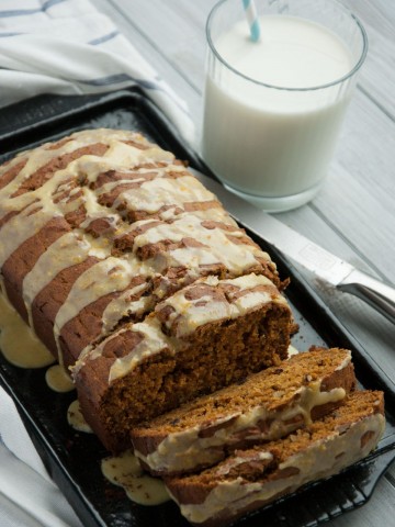 This healthy pumpkin bread is made with 100% whole wheat flour and other wholesome ingredients, leaving room for topping with a zesty orange decadent glaze.