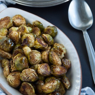 Roasted brussel sprouts are caramelized to perfection and then tossed in a tangy, savory browned butter sauce for ultimate yum factor.