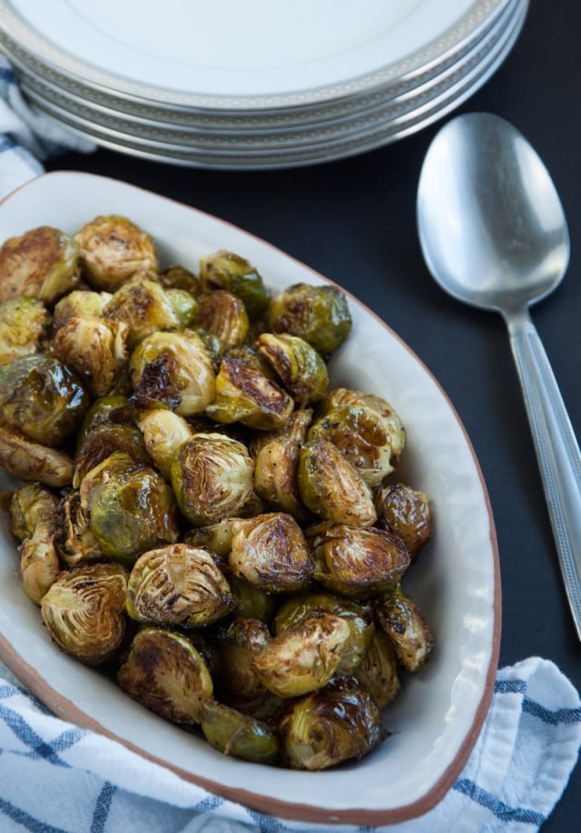 Roasted brussel sprouts are caramelized to perfection and then tossed in a tangy, savory browned butter sauce for ultimate yum factor.