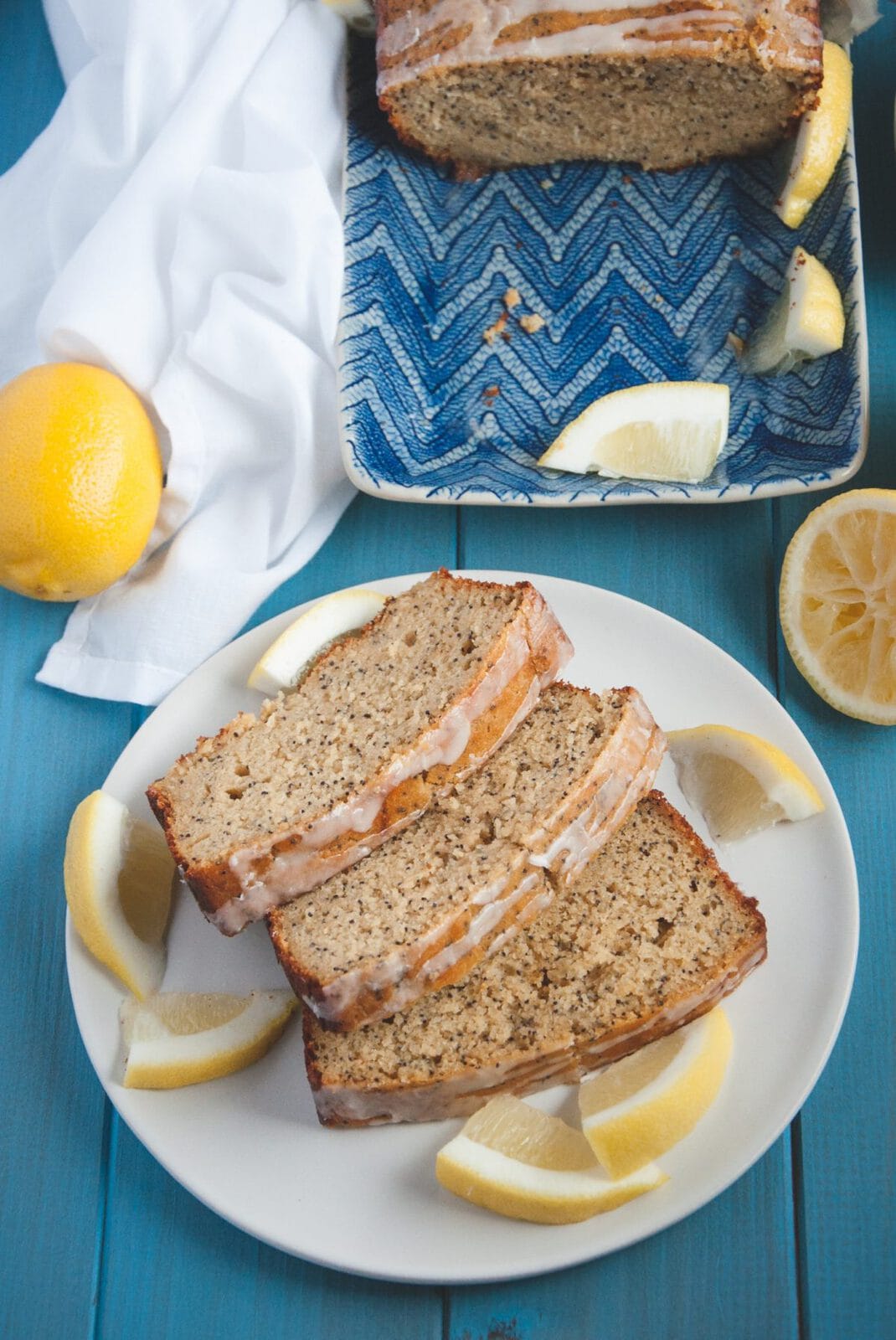 Plate with Whole Wheat Lemon Poppy Seed Bread with glaze