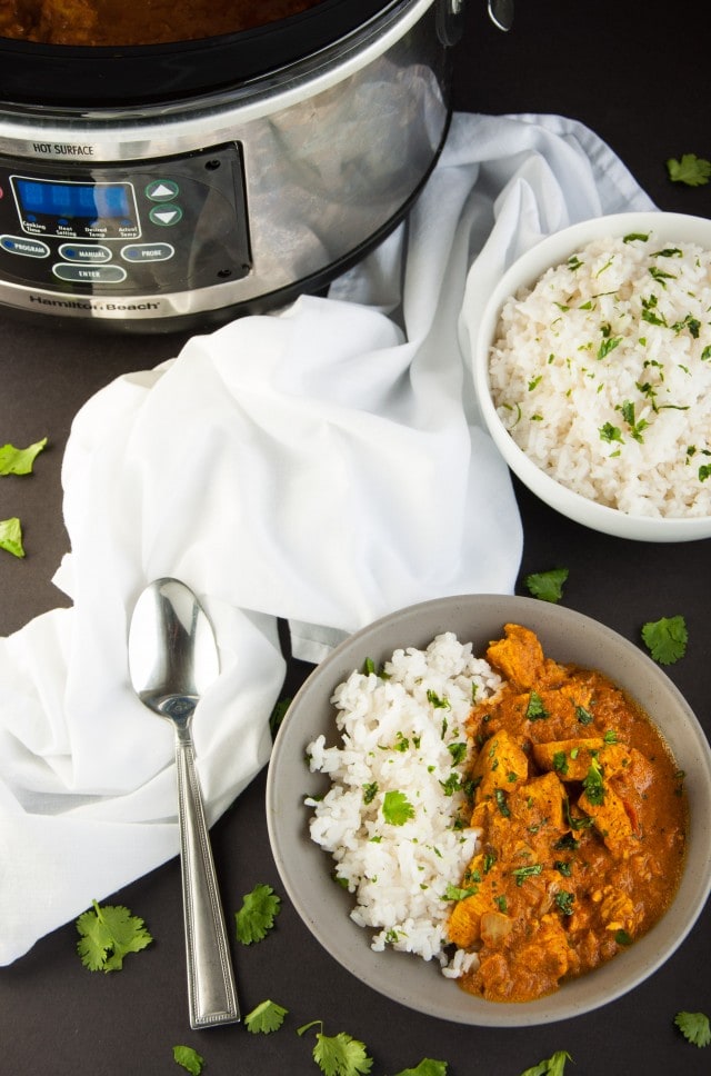 Let the crock-pot do the work with this exotic spice filled chicken Indian curry and come home to a delicious dinner simmering and ready to eat. Yum!