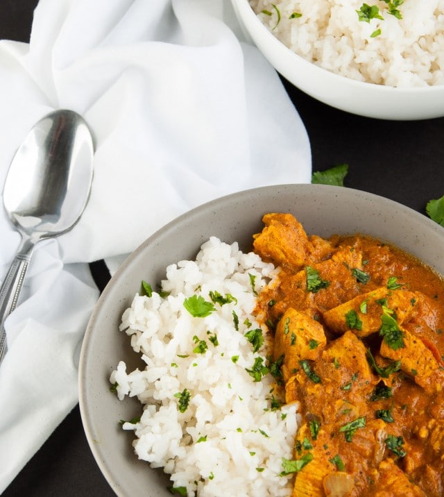 Let the crock-pot do the work with this exotic spice filled chicken Indian curry and come home to a delicious dinner simmering and ready to eat. Yum!