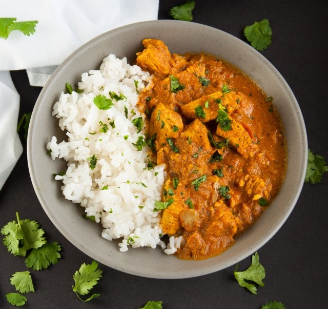 Let the crock-pot do the work with this exotic spice filled chicken Indian curry and come home to a delicious dinner simmering and ready to eat. Yum!