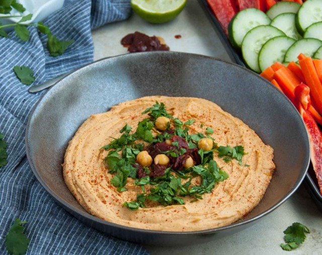 Chipotle hummus is a little bit spicy, ultra creamy and 100% delicious! Its packed with lean protein and fiber making it the perfect healthy snack.