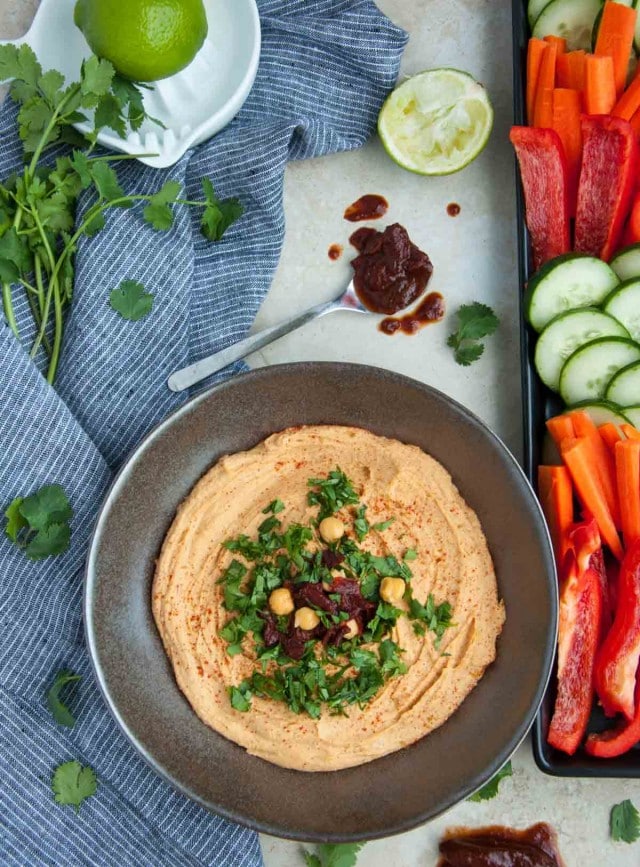 Chipotle hummus is a little bit spicy, ultra creamy and 100% delicious! Its packed with lean protein and fiber making it the perfect healthy snack.