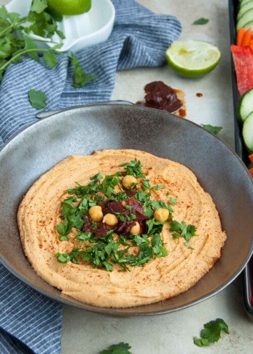 Chipotle hummus is a little bit spicy, ultra creamy and 100% delicious! Its packed with lean protein and fiber making it the perfect healthy snack.