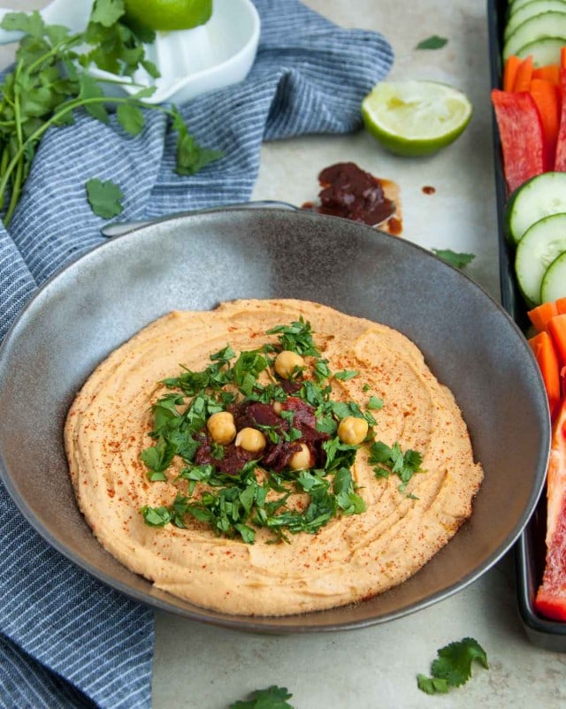 Chipotle hummus is a little bit spicy, ultra creamy and 100% delicious! Its packed with lean protein and fiber making it the perfect healthy snack.