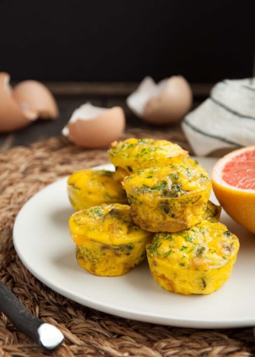 These mini broccoli cheddar egg muffins are just like crustless quiches - fancy but easy as can be! Each one has 7 grams of protein and under 100 calories.