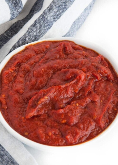 Spicy, smooth, delicious red enchilada sauce that goes equally well with classic chicken or roasted vegetable enchiladas.