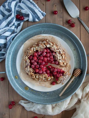 In this tasty galette, tart sour cherries and heart healthy almonds come together in a nutritious whole wheat and almond flour crust for a perfect healthy desert.