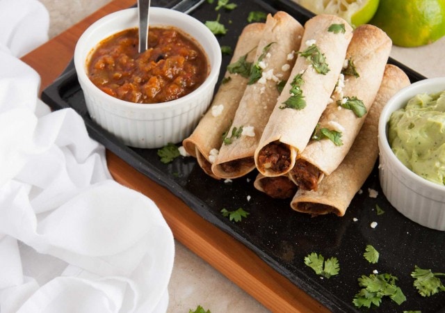 These baked black bean taquitos are both vegetarian, packed with veggies, and way lighter than the store bought kind without sacrificing any flavor.