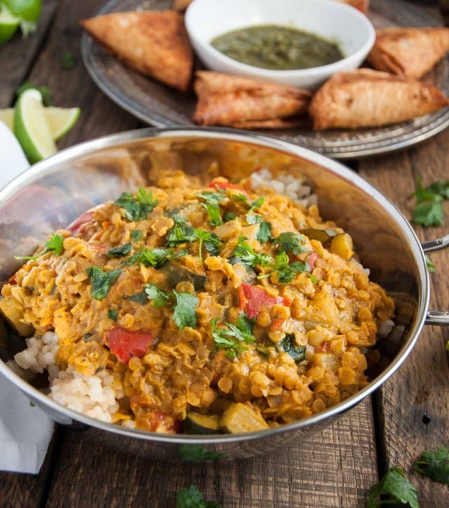 Filled with aromatic spices, lentils never tasted so good! This healthy red lentil dal is inexpensive, nutritious, high in protein, and brimming with flavor.