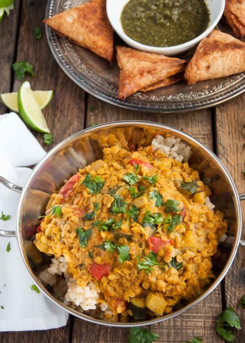 Filled with aromatic spices, lentils never tasted so good! This healthy red lentil dal is inexpensive, nutritious, high in protein, and brimming with flavor.