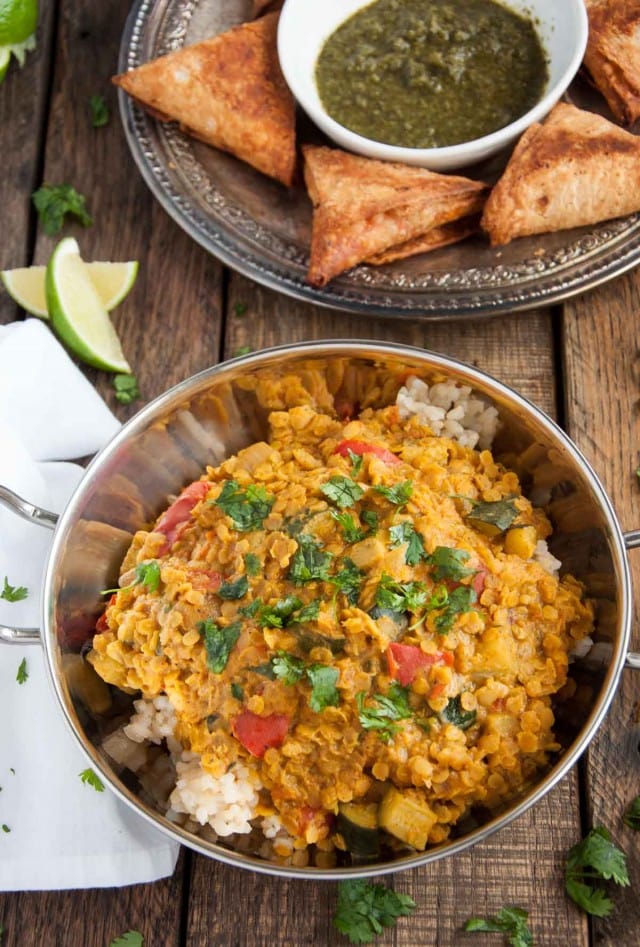 Filled with aromatic spices, lentils never tasted so good! This healthy red lentil dal is inexpensive, nutritious, high in protein, and brimming with flavor.