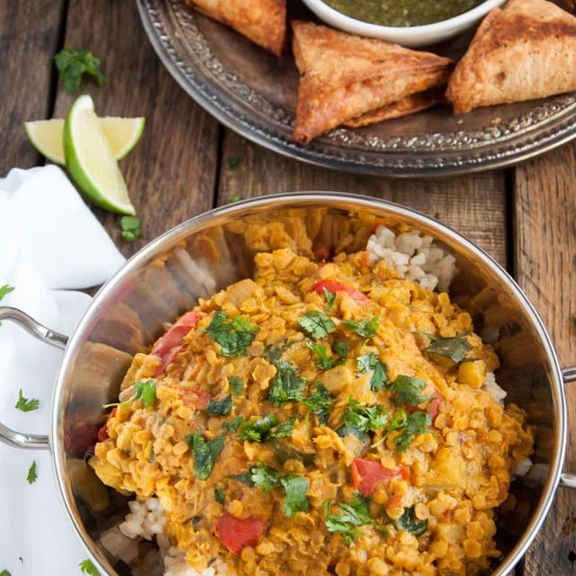 Filled with aromatic spices, lentils never tasted so good! This healthy red lentil dal is inexpensive, nutritious, high in protein, and brimming with flavor.