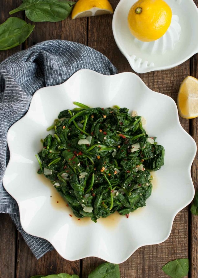 quick and easy sauteed spinach overhead picture with red pepper flakes