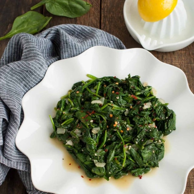  quick and easy sauteed spinach on a plate