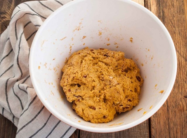 These easy pumpkin scones are both healthy and delicious! They're loaded with pumpkin, toasted pecans, and use whole wheat flour and less sugar. - Feasting Not Fasting