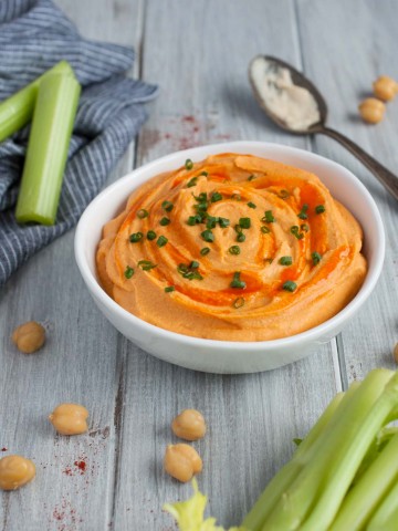 This naturally vegan buffalo dip uses garbanzo beans instead of chicken and has all the same great flavor and protein but is sooo much healthier!