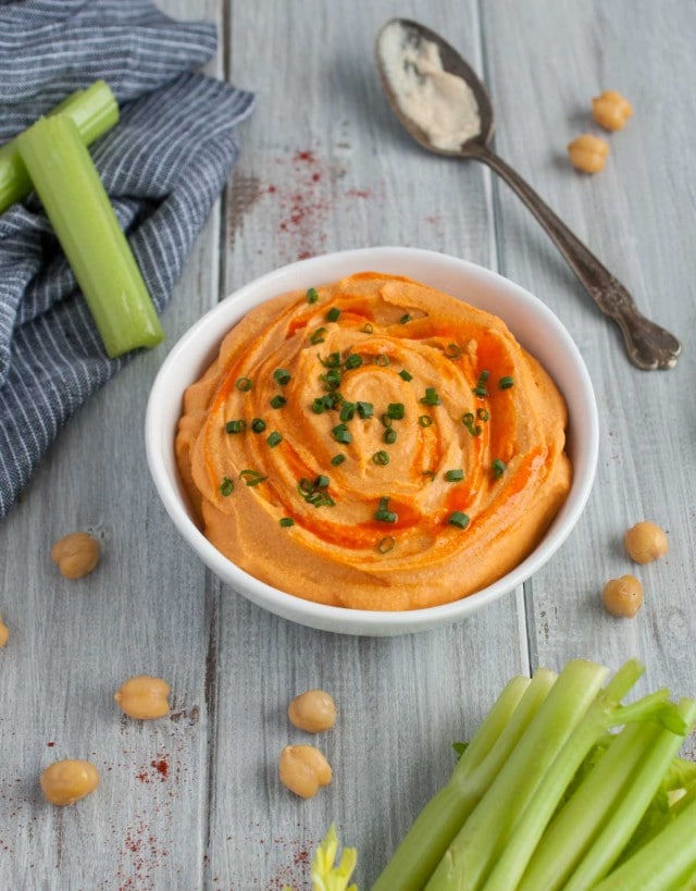 This naturally vegan buffalo dip uses garbanzo beans instead of chicken and has all the same great flavor and protein but is sooo much healthier!