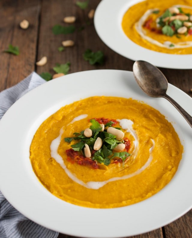 This thick, creamy sweet meat squash soup is naturally vegan, yet extremely filling and delicious! The rich curry flavor is accented with fresh cilantro, chili sauce, and roasted peanuts.