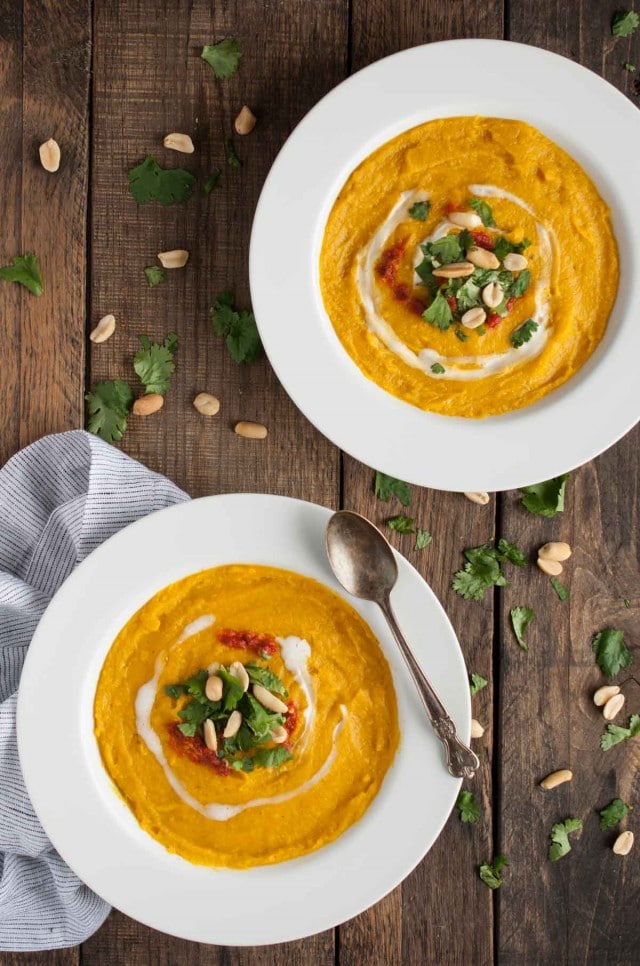 This thick, creamy sweet meat squash soup is naturally vegan, yet extremely filling and delicious! The rich curry flavor is accented with fresh cilantro, chili sauce, and roasted peanuts.