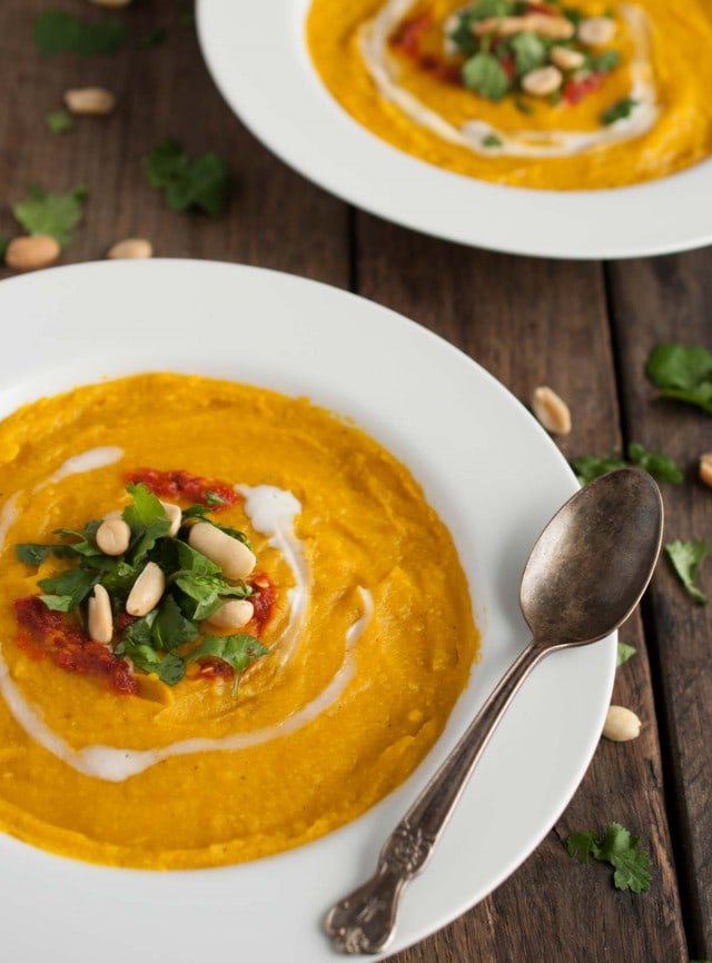This thick, creamy sweet meat squash soup is naturally vegan, yet extremely filling and delicious! The rich curry flavor is accented with fresh cilantro, chili sauce, and roasted peanuts.