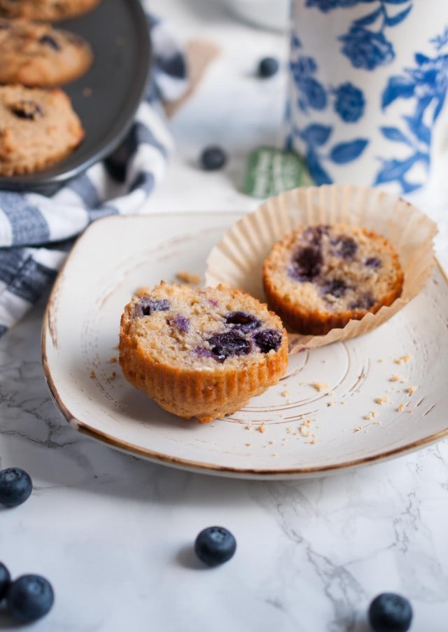These whole wheat blueberry muffins are made with wholesome ingredients like honey, coconut oil, and Greek yogurt to your make breakfast more nutritious.
