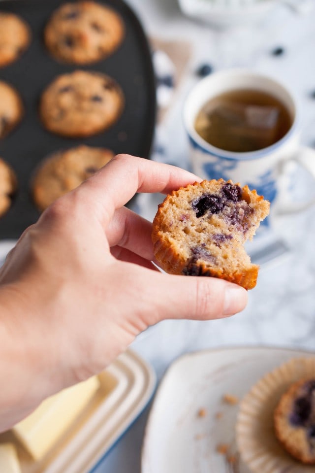 These whole wheat blueberry muffins are made with wholesome ingredients like honey, coconut oil, and Greek yogurt to your make breakfast more nutritious.