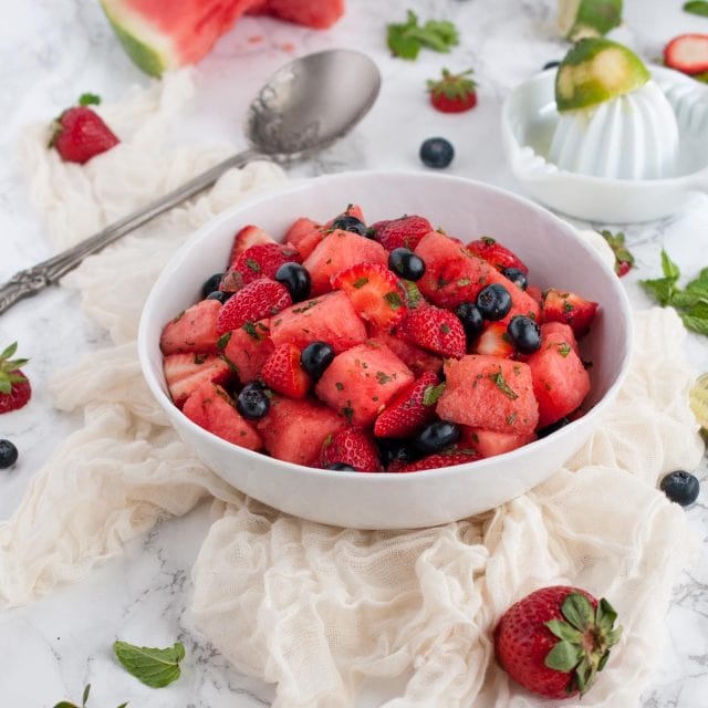 Watermelon mint salad is a refreshing side dish for any summer BBQ with lime adding a pop of unexpected flavor that makes this a surefire winner.