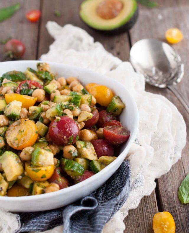 This chickpea salad so light and refreshing with fresh basil, balsamic vinegar, tomatoes, and avocado. Its naturally vegan but has so much flavor, you'd never know it!