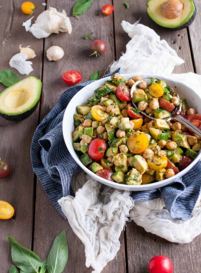 This chickpea salad so light and refreshing with fresh basil, balsamic vinegar, tomatoes, and avocado. Its naturally vegan but has so much flavor, you'd never know it!