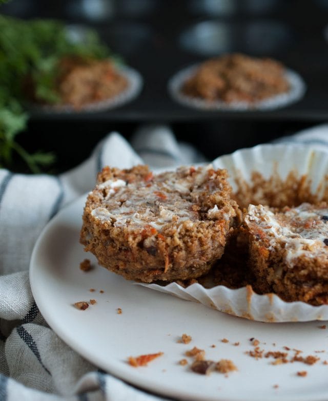 These healthy carrot muffins are made with oat flour, applesauce, honey, coconut oil and a tasty mix of spices that will remind you of carrot cake!