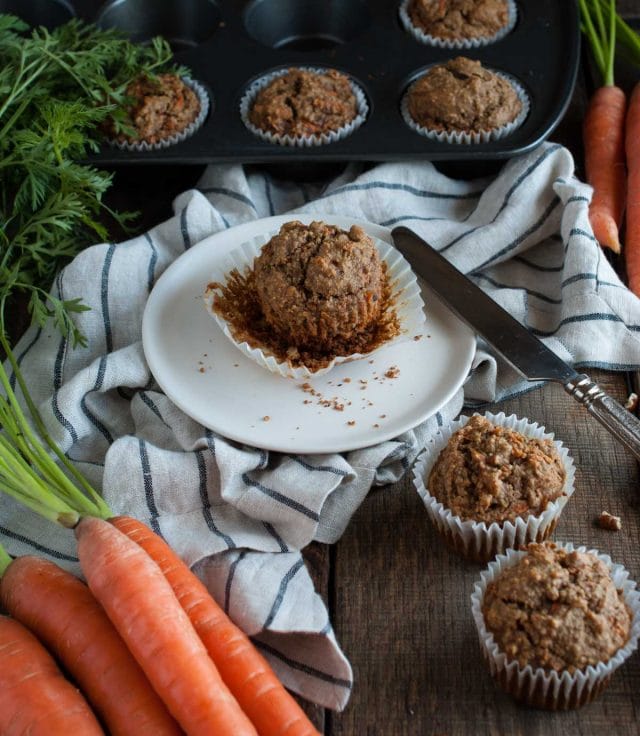 These healthy carrot muffins are made with oat flour, applesauce, honey, coconut oil and a tasty mix of spices that will remind you of carrot cake!