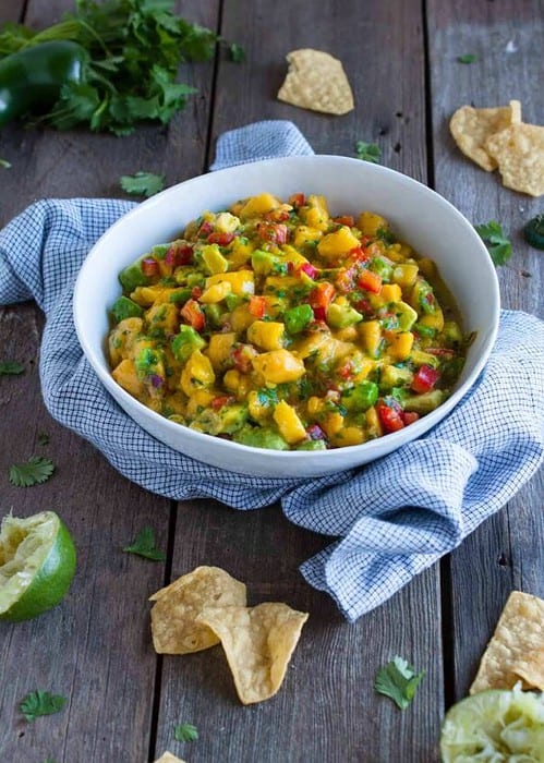 Mango salsa is a refreshing break from the usual with pops of fresh fruit, creamy avocado, and tangy lime. And its so easy, it can be ready in 15 minutes!