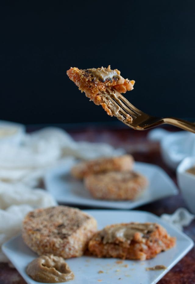 These brown rice sweet potato patties are enhanced by a savory tahini dipping sauce that makes them a tasty and healthy appetizer, light meal, or snack.