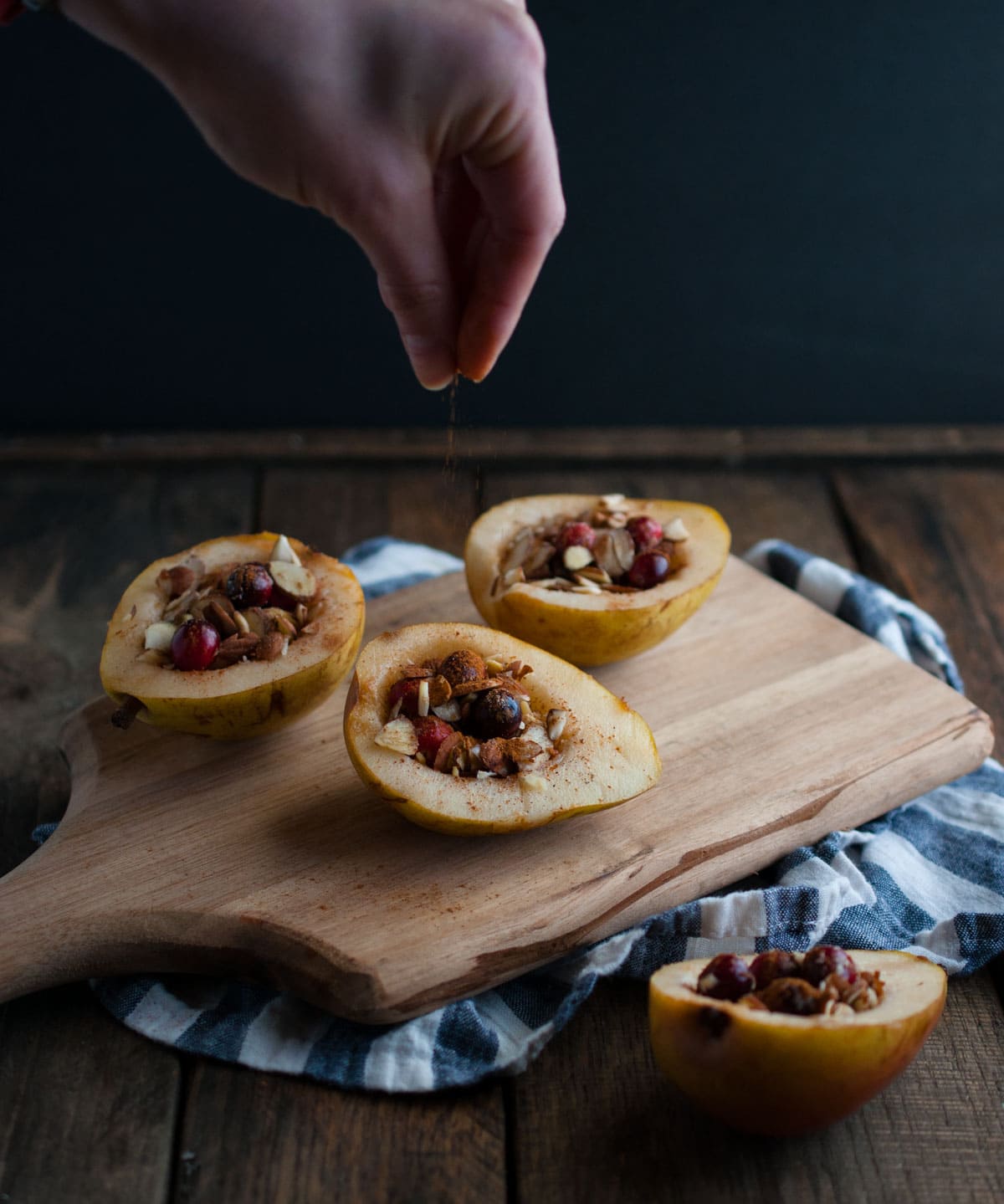 These baked pears with honey and almonds are the perfect healthy dessert for the holidays with cranberries and a nutty crunch all for 200 calories! 