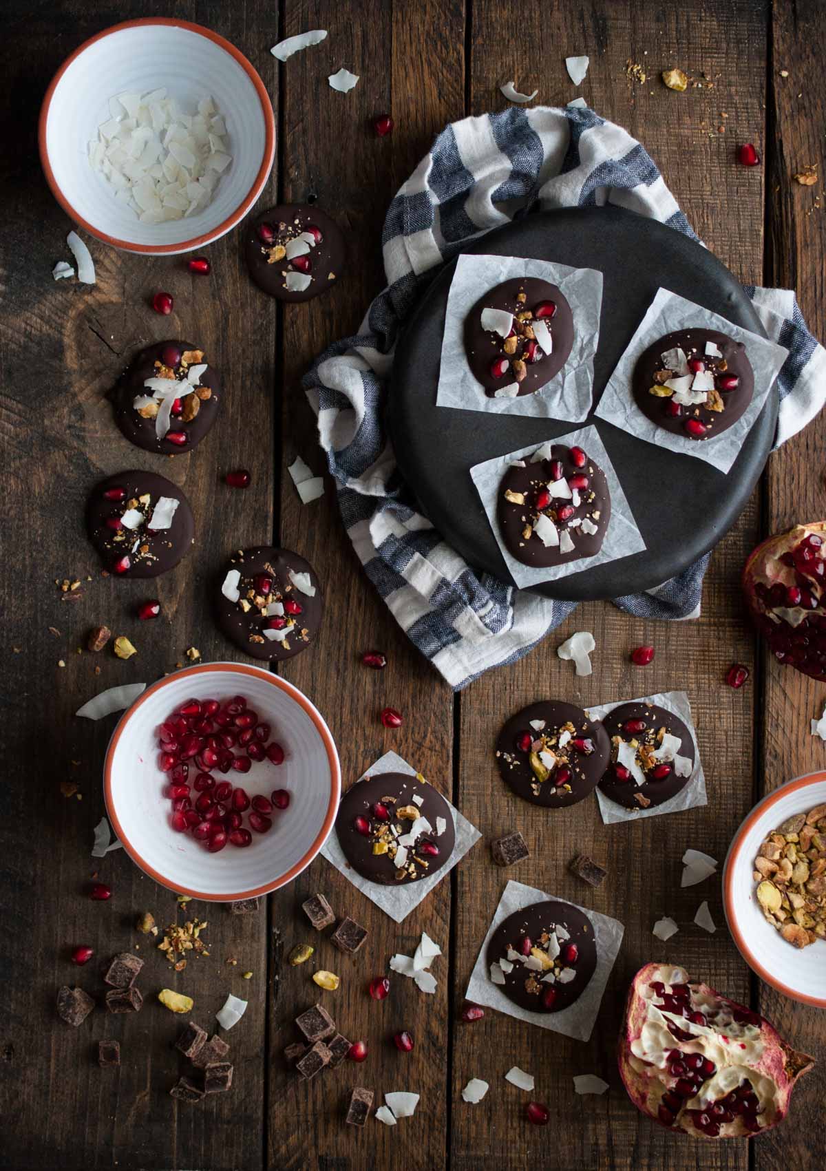 Dark chocolate pomegranate bites are a simple tasty treat to eat or give as Christmas gifts. Made to satisfy a sweet tooth for under 100 calories! 